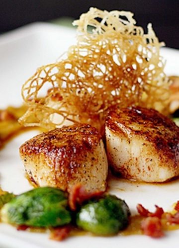 Seared Scallops with Golden Raisin Puree and Bacon Braised Brussels Sprouts