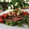 Blistered Grape Tomatoes Over Steak and Blue Cheese Salad