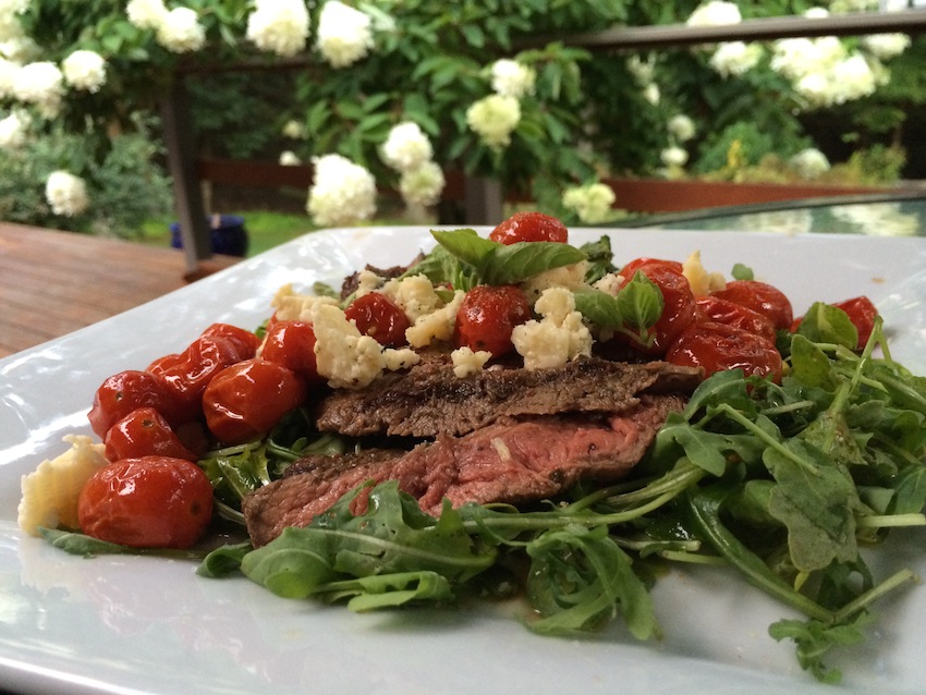 Blistered Grape Tomatoes Over Steak and Blue Cheese Salad